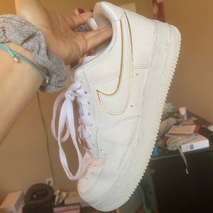Gold Nike Air Force Ones